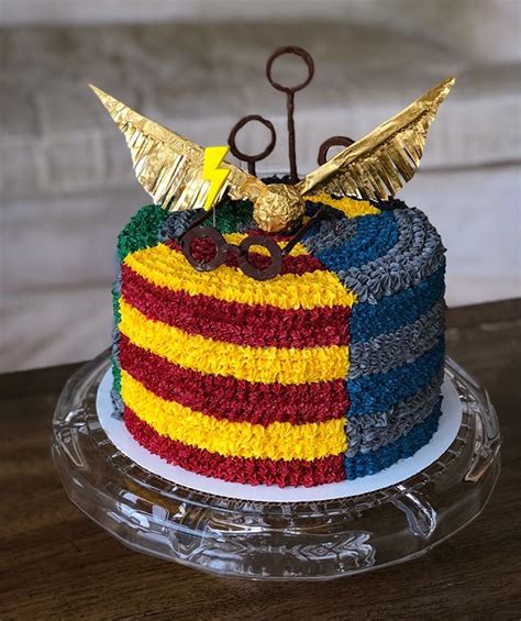 A harry potter themed nursery for any witch or wizard ready for their hogwarts letter. Harry Potter cake idea birthday party, round cake with ...