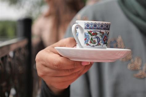 Premium Photo Women Holding A Turkish Coffee Cup