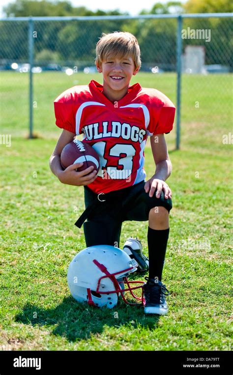 Portrait Of A Happy Youth Football Player Stock Photo Alamy