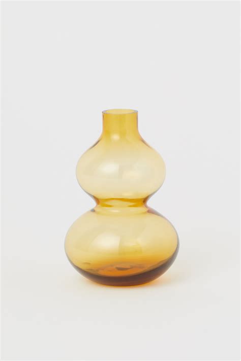 Accent your room with a decorative flower vase from h&m home. H&M + Small Glass Vase