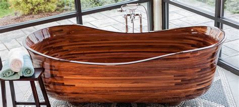 Plus wood holds the heat longer than other tub material. NK Woodworking Wooden Bathtubs | Wooden bathtub, Wood ...