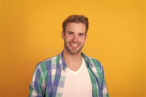 Handsome Caucasian Unshaven Guy Portrait Happy Smiling In Checked Shirt