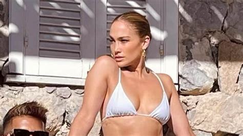 Jennifer Lopez 54 Flaunts Her Incredible Figure In A Skimpy White Bikini Before Slipping Into