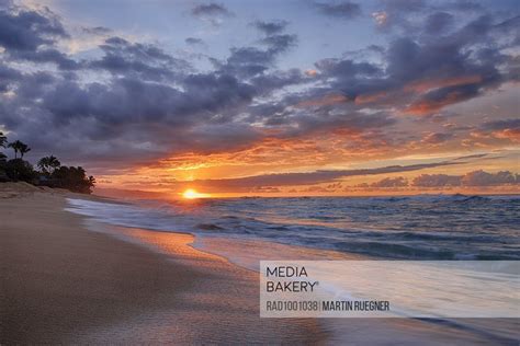 Mediabakery Photo By Radius Images Sunset And Surf On