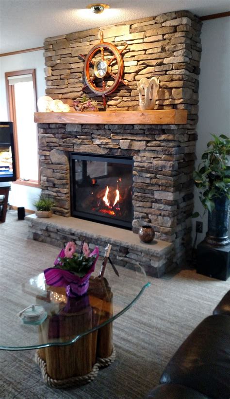 Plan your layout using a paper template, then remove the old surround and attach a layer of wire mesh to give your mortar. Stacked stone fireplace ideas for your home 6 | Inspira Spaces