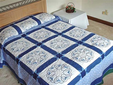 One pattern information sheet which includes a list of symbols, identification numbers and names of dmc floss used. Blue Hearts Cross Stitch Quilt