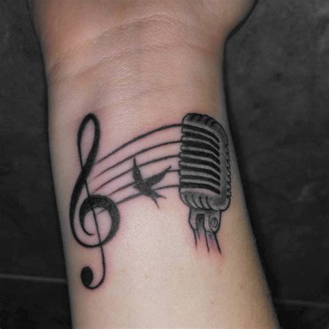 For any lover of music, this tattoo is of all the classic symbols you would find on a cassette player. Music Wrist Tattoos Designs, Ideas and Meaning | Tattoos ...