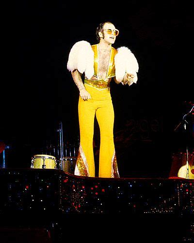 Any movie depicting elton john is going to need spectacular stage outfits. Elton John's Outfits Through the Years | Elton john ...