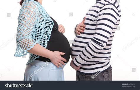 Pregnant Woman Compare Belly With Husband Stock Photo 46759510