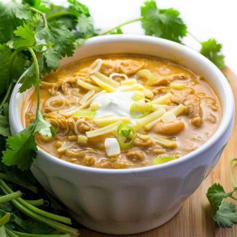 This easy white chicken chili recipe is a creamy version of chili with white beans, roasted chicken, cream, poblano peppers and anaheim peppers. The best White Chili Ever! Tender shredded chicken and white beans simmered in the most ...