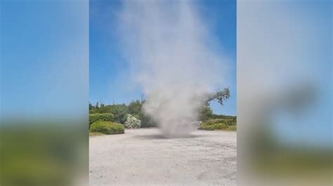 Woman left shocked as dust devil sweeps through Bluestone resort car