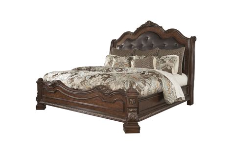 Ledelle King Sleigh Headboard Bed With Upholstered Faux Leather In Brown