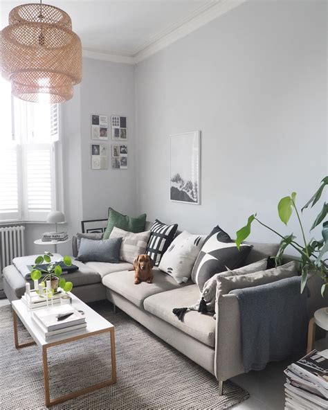 Scandinavian Style Living Room With Grey Walls And L Shapes Sofa