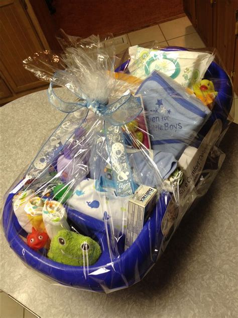 We sent this to a colleague for her new baby boy, and the gift was a hit! Baby boy bathtub gift basket | Baby shower ideas ...