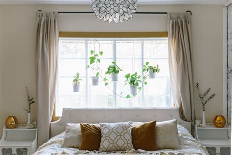 10 Stunning Bedrooms That Show How To Put A Bed In Front Of A Window