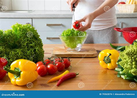 Young Woman Making Salad In The Kitchen Stock Photo Image Of Meal
