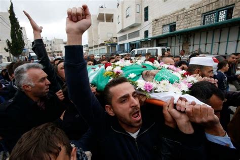 Wounded Palestinian Assailant Killed By Israeli Soldier Buried In