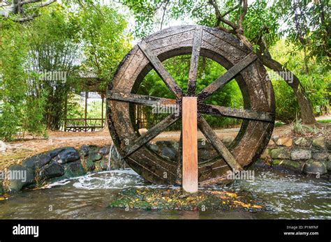 Wooden Wheel Of Ancient Water Mill In Village Stock Photo Alamy