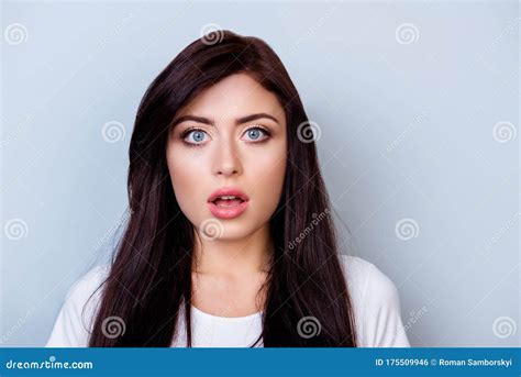 Close Up Portrait Of Cute Young Shocked Woman With Opened Mouth