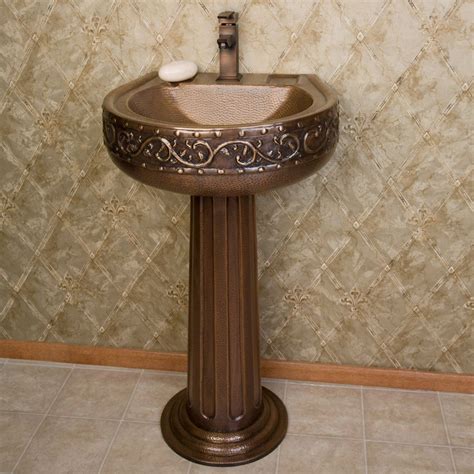 A pedestal sink can make a bathroom look more open and stylish. Vine Hammered Copper Pedestal Sink | Pedestal sink ...