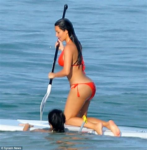 Kim Kardashian Shows Off Her Fabulous Curves In Red Bikini After