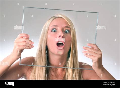 Young Female With Face Smashed Up Against Glass Stock Photo Alamy