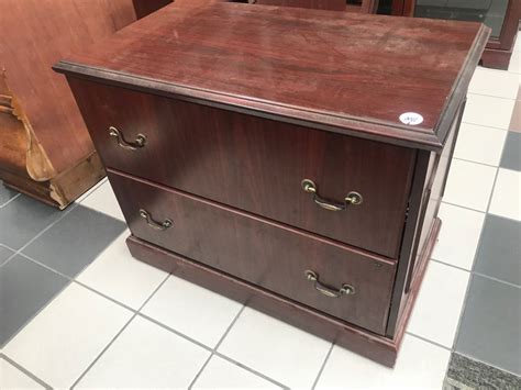 A cookie is a small file which asks permission to be placed on your computer's hard drive. Lot Detail - Pair of Mahogany 2 Drawer File Cabinets