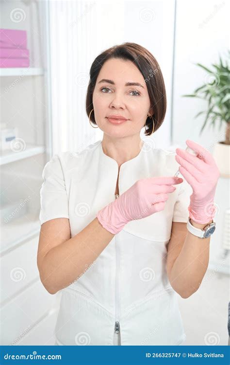 Pretty Woman Doctor Draws Medicine Into A Syringe Stock Image Image Of Aged Clinic 266325747