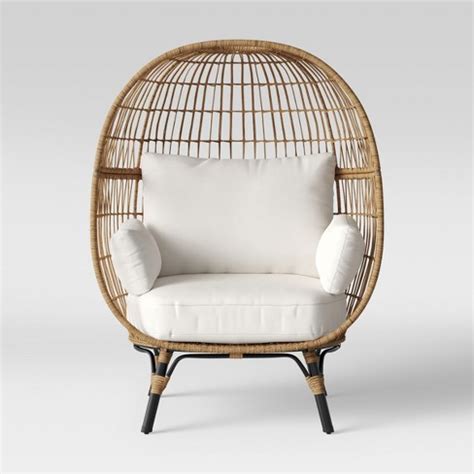 The back displays an upholstered backrest and the seat features a loose cushion that rests on a stick deck (shown). Southport Patio Egg Chair - Opalhouse™ : Target