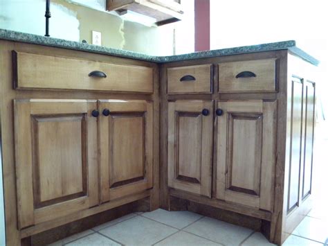If you plan to use paint to refinish your cabinets, they will need to be primed first. maple cabinets stained with dark mahogany | Staining ...