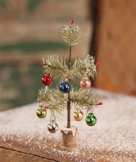 Choosing the best feather mattress topper. Old Fashioned Tiny Feather Tree with Ornaments | Christmas ...