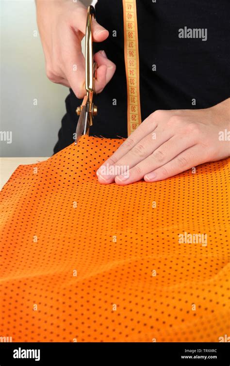 Cutting Fabric With Tailors Scissors Stock Photo Alamy