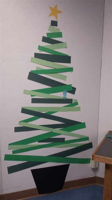Christmas Tree With Construction Paper Strips And A Bird Christmas