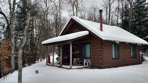 Secluded cabin in pine forest. 29 cozy Michigan cabins to rent for a winter getaway ...