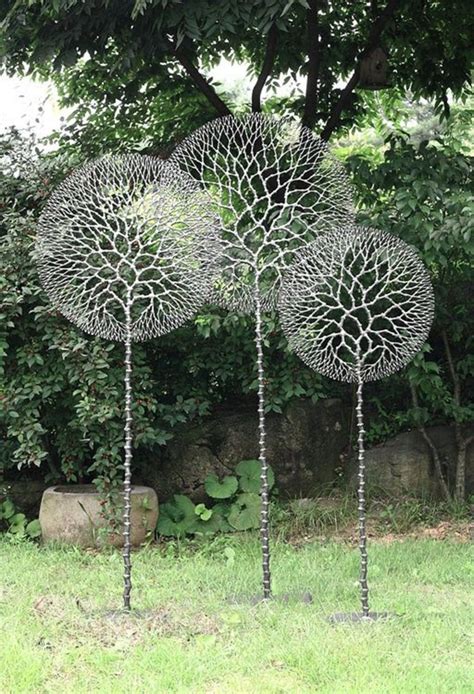 Also from ' zest it up ' is this cool copper wind spinner. Easy diy Garden Art Ideas 200 | Lawn art, Garden art ...