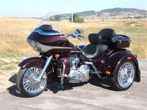 Custom touring style and easy handling features that lets you roll with confidence for longer. Maroon Harley-Davidson Trike By Lehman Trikes