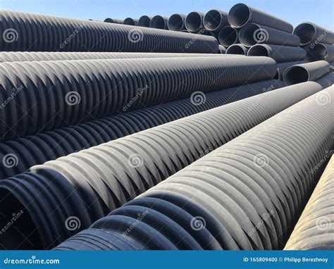 Stacked Corrugated Pvc Pipes At The Outdoor Warehouse Drainage