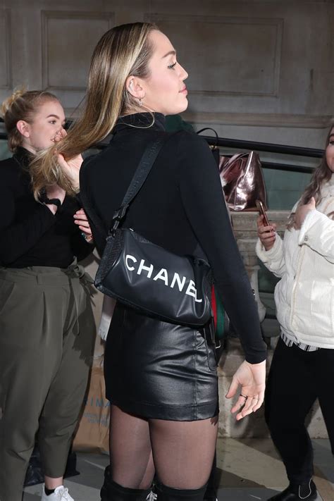 Miley Cyrus Leather Skirt In London Popsugar Fashion