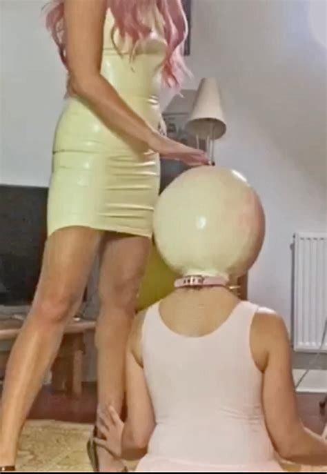 Mistress Ivy Slave Girl In Latex Inflatable Hood