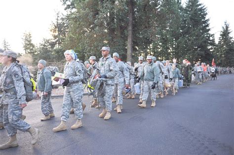 Soldiers Helping Soldiers Fill Santas Castle With Christmas Toys And