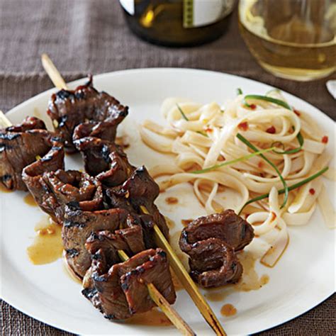 They serve beef bulgogi (thinly sliced korean beef) over noodles, rice, and cabbage with these totally delicious sauces. Korean-Style Beef Skewers with Rice Noodles Recipe | MyRecipes