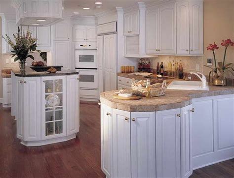 Maybe you would like to learn more about one of these? www.giesendesign.com kraft kitchen cabinets with white ...