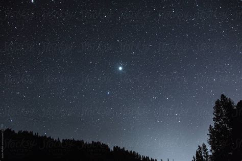 Very Bright Star In The Night Sky By Justin Mullet Stocksy United
