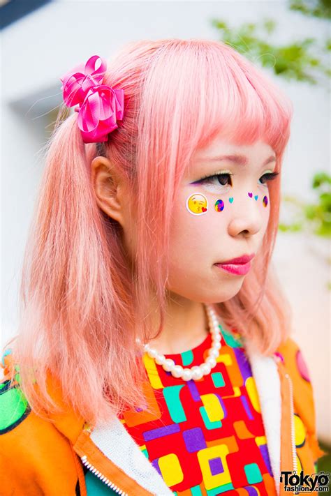 twin tailed harajuku girl in colorful pop fashion w kinji candy stripper and rainbow socks