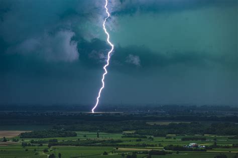 Catch Of The Day With Close Up Lightning Entering Ground From Clouds