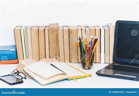 Open Textbook Notebook Smartphone Laptop Computer Stack Of Books