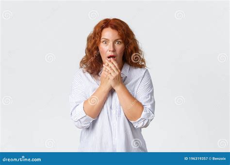 Shocked And Amazed Gasping Middle Aged Redhead Woman Open Mouth Cover