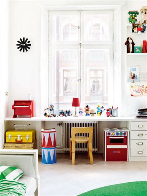 Long gone are the days when you can basically throw some stuff with each other in a room to create a children's bedroom. eclectic-colorful-kids-study-rooms - HomeMydesign