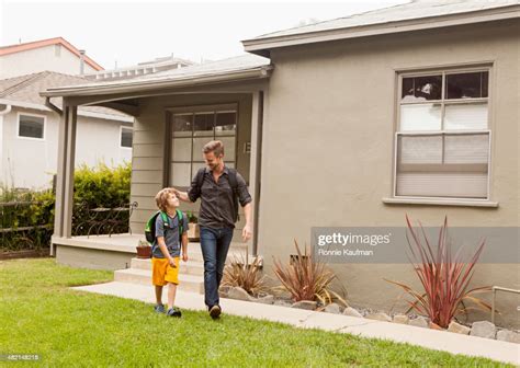 Caucasian Father Walking Son To School Photo Getty Images