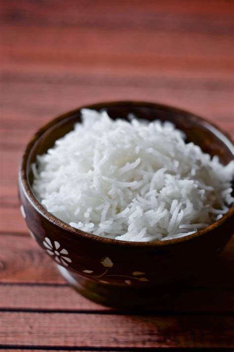 The first step in cooking basmati rice is to properly measure your ingredients. Fail-proof Stovetop Basmati Rice | Simmer to Slimmer